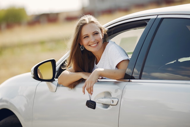 A woman in a car